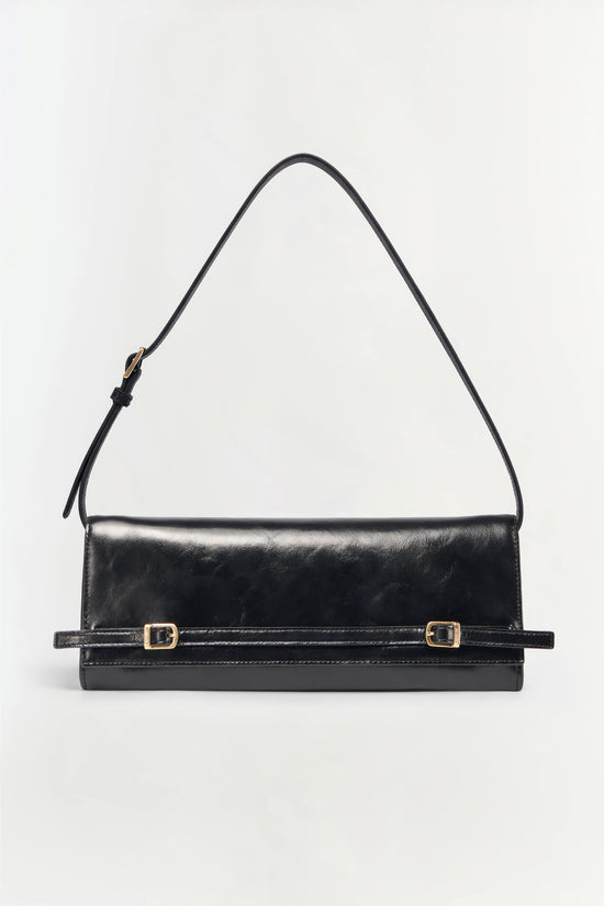 Black leather clutch with gold buckle details and adjustable shoulder strap.