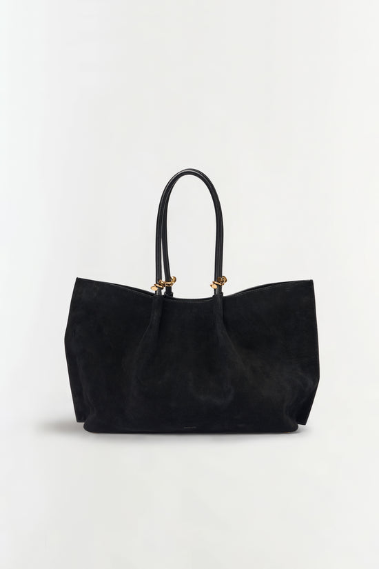 Black suede tote bag with dual handles and gold-tone hardware.