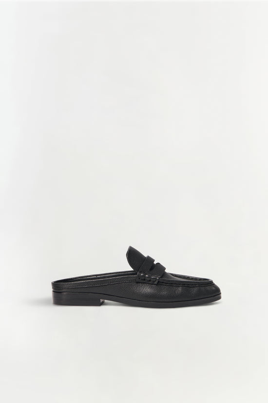 Black pebbled leather loafer mule with decorative knot detail on upper, shown in side profile.
