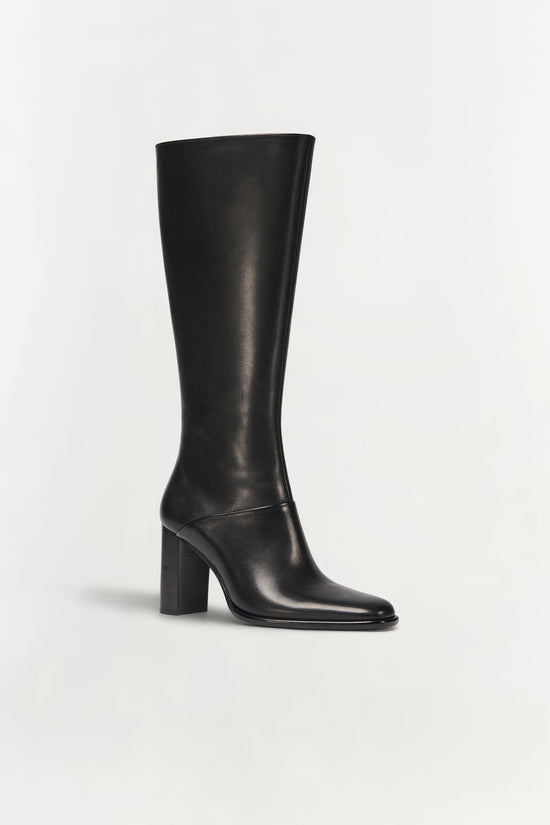 Black leather knee-high boot with a chunky block heel and rounded toe.