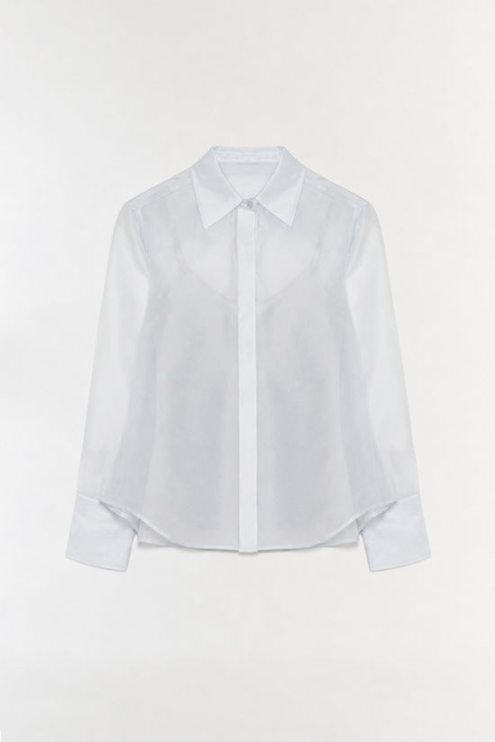 White organza shirt with pointed collar and button front closure.