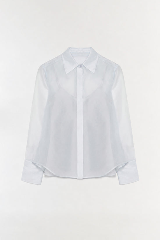 White organza shirt with pointed collar and button front closure.